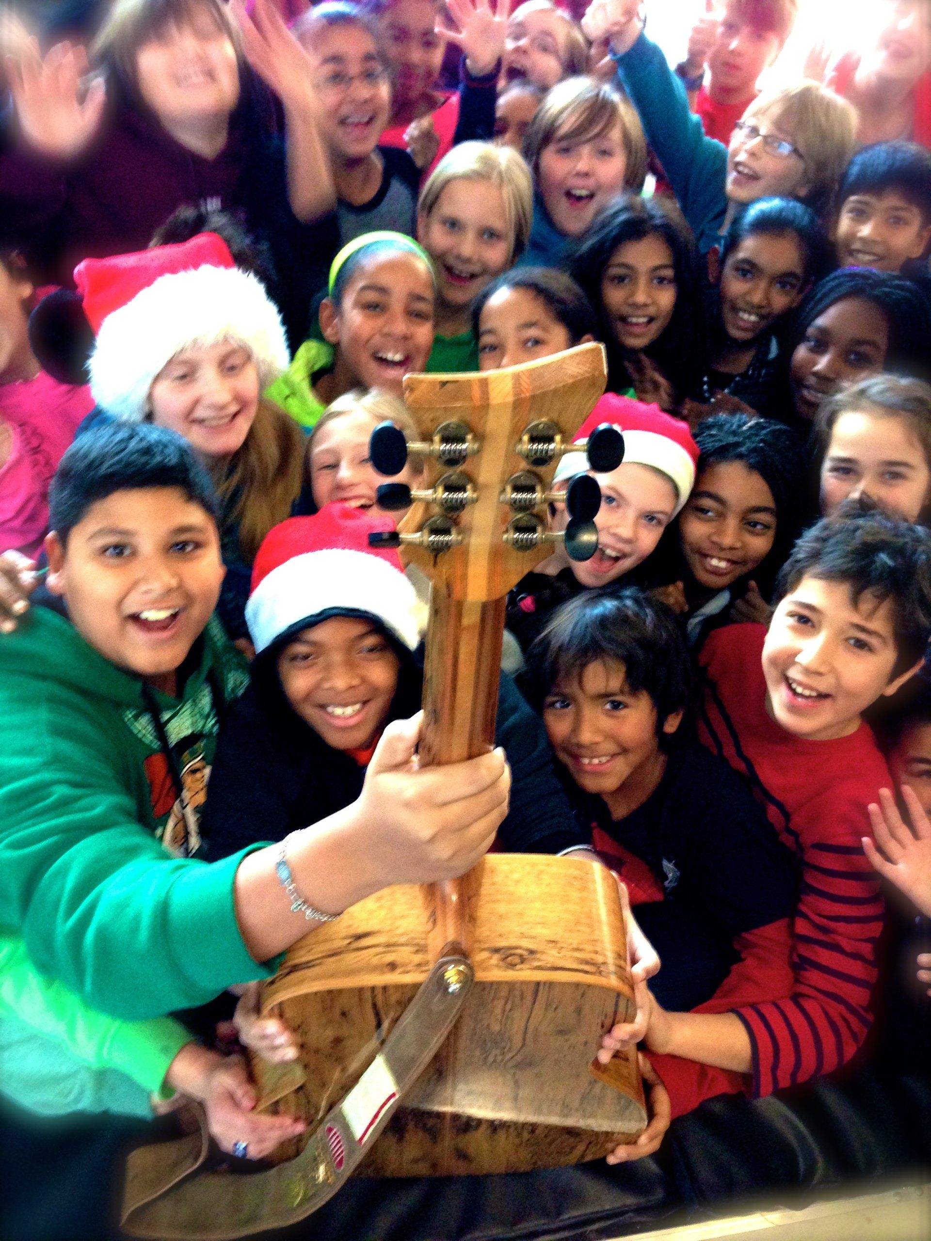 Students at a public school in Pickering ON hold Voyageur excitedly.