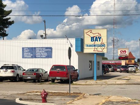 Bay Transmissions — Little Retro Car Goes By Countryside Road in Bay City, MI