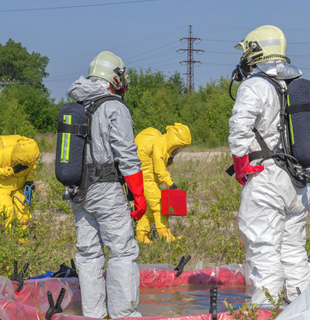 Hoarder Cleanup — Workers Wearing a Anti-Infection Suit in Brandon, MS