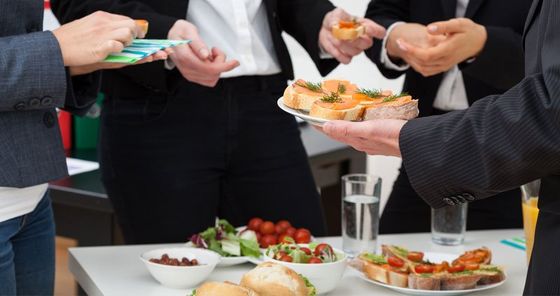 Managers meeting with healthy food in office Managers meeting with healthy food in office