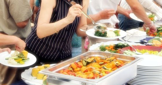 People serving themselves in an event