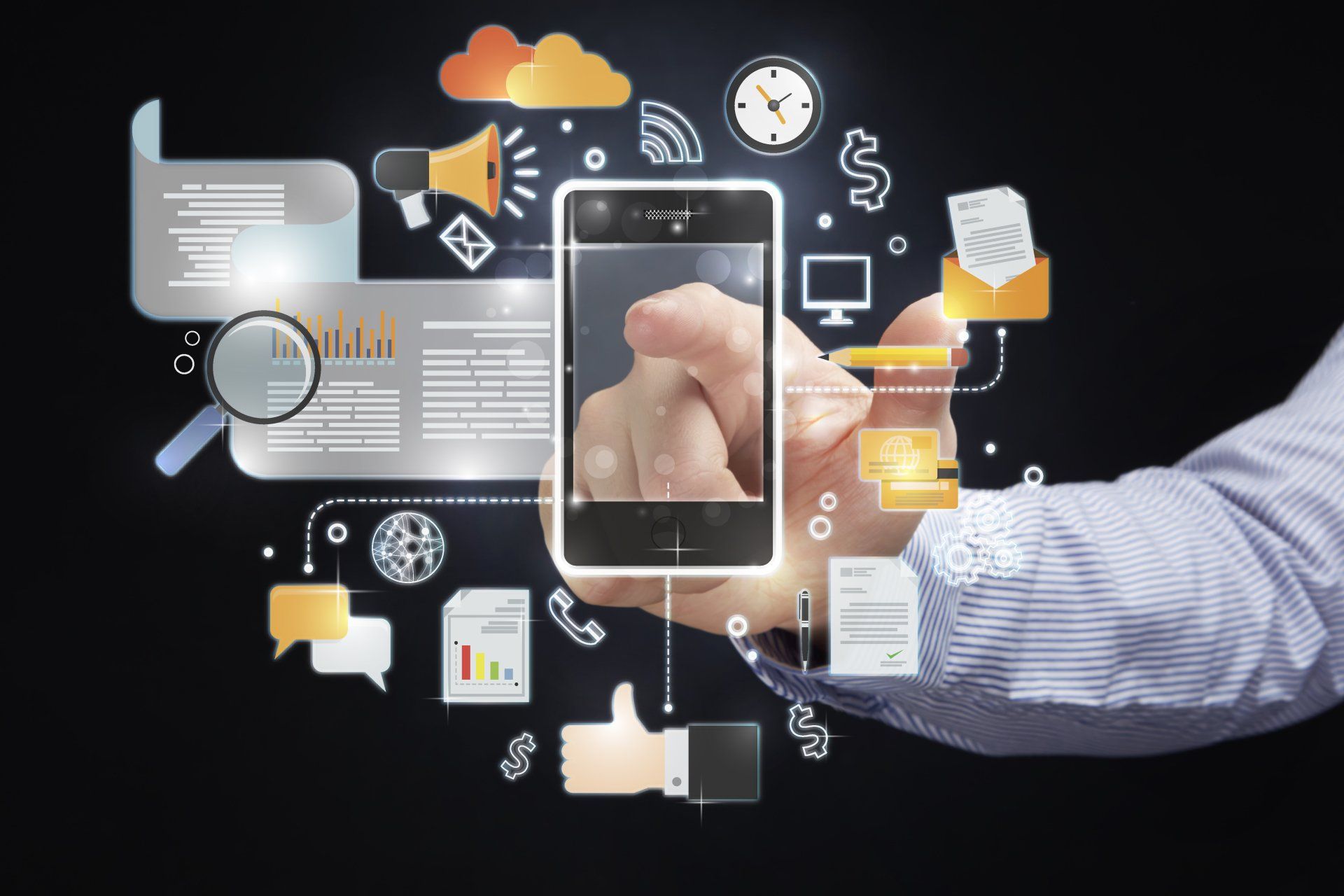 A hand is holding a smart phone with icons surrounding it