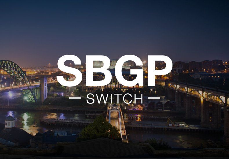 A logo for sbgp switch with a bridge in the background