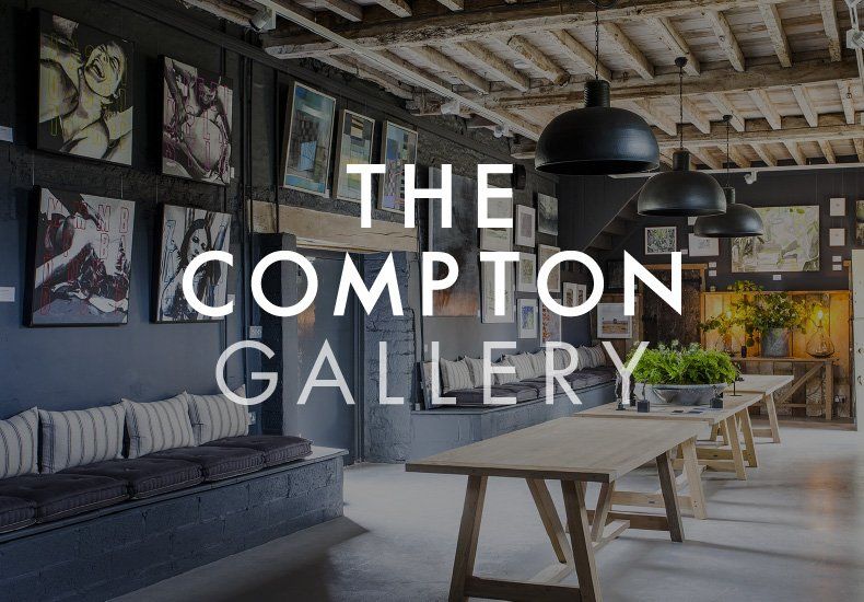 A picture of a room with the words the compton gallery on it