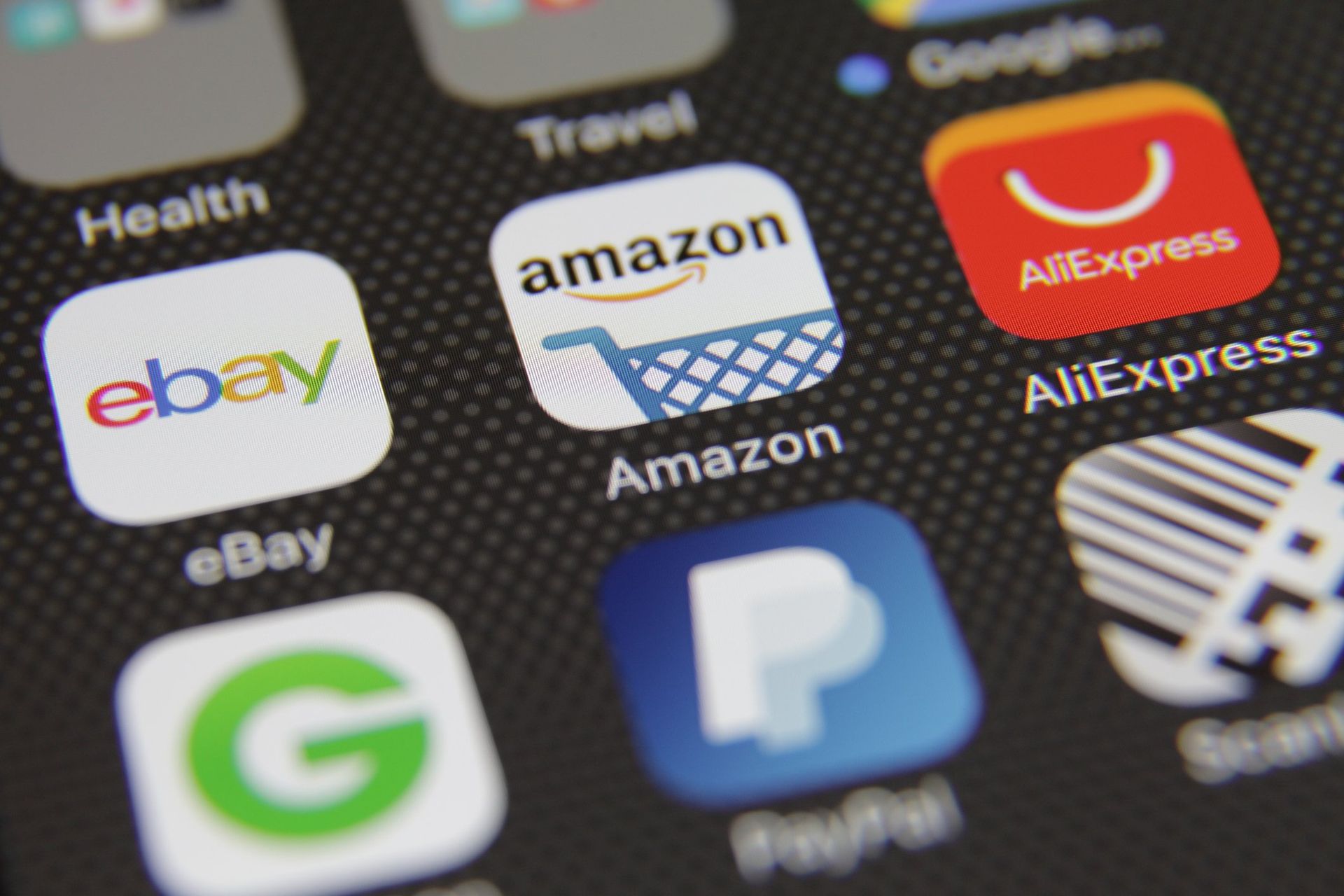 Several apps on a phone including amazon ebay and paypal