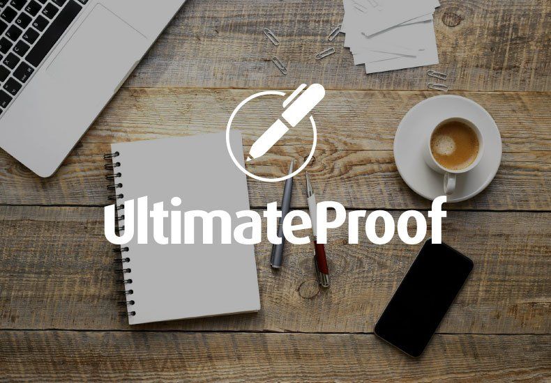 Ultimate proof is written on a wooden table