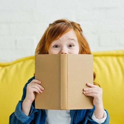Homework — A Little Girl With Her Book In Stratford, NJ