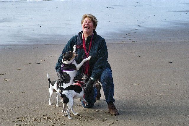 Fun at coast with pups wearing Puppy Posh custom dog collars