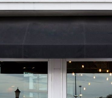 Awnings of the Upstate — Simple Black Awning in Spartanburg, SC Awnings of the Upstate — Simple Black Awning in Spartanburg, SC