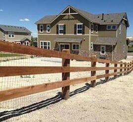 Wood Fence with a House - wood fence in Dr, Aurora, CO