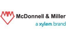 Logo for McDonnell & Miller, a Xylem brand, featuring a red and white diamond shape with a crown design.