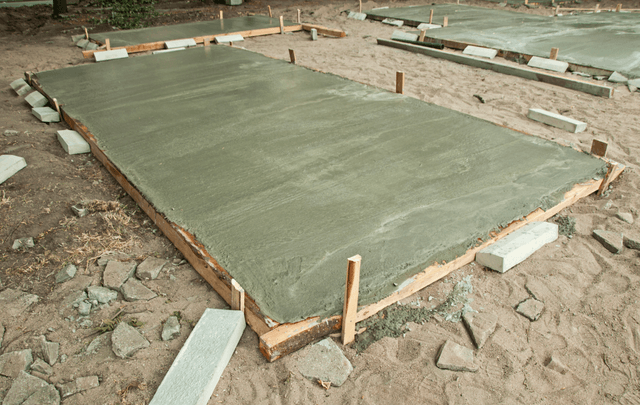 This is a picture of a freshly poured concrete slab on grade.