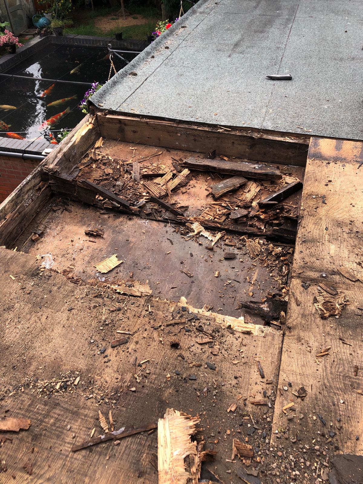 a roof with a lot of pieces of wood on it
