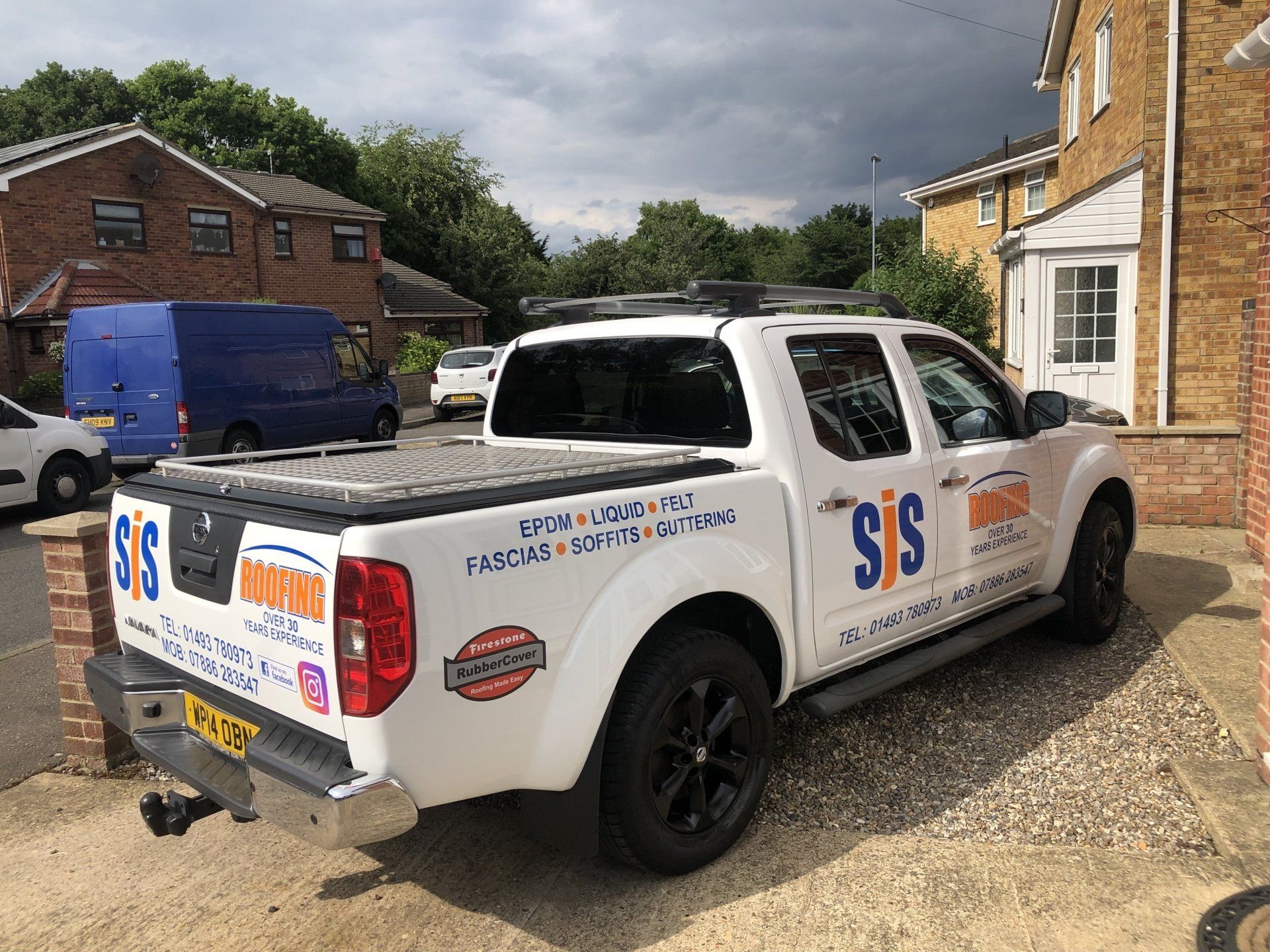 a white truck with sis written on the side