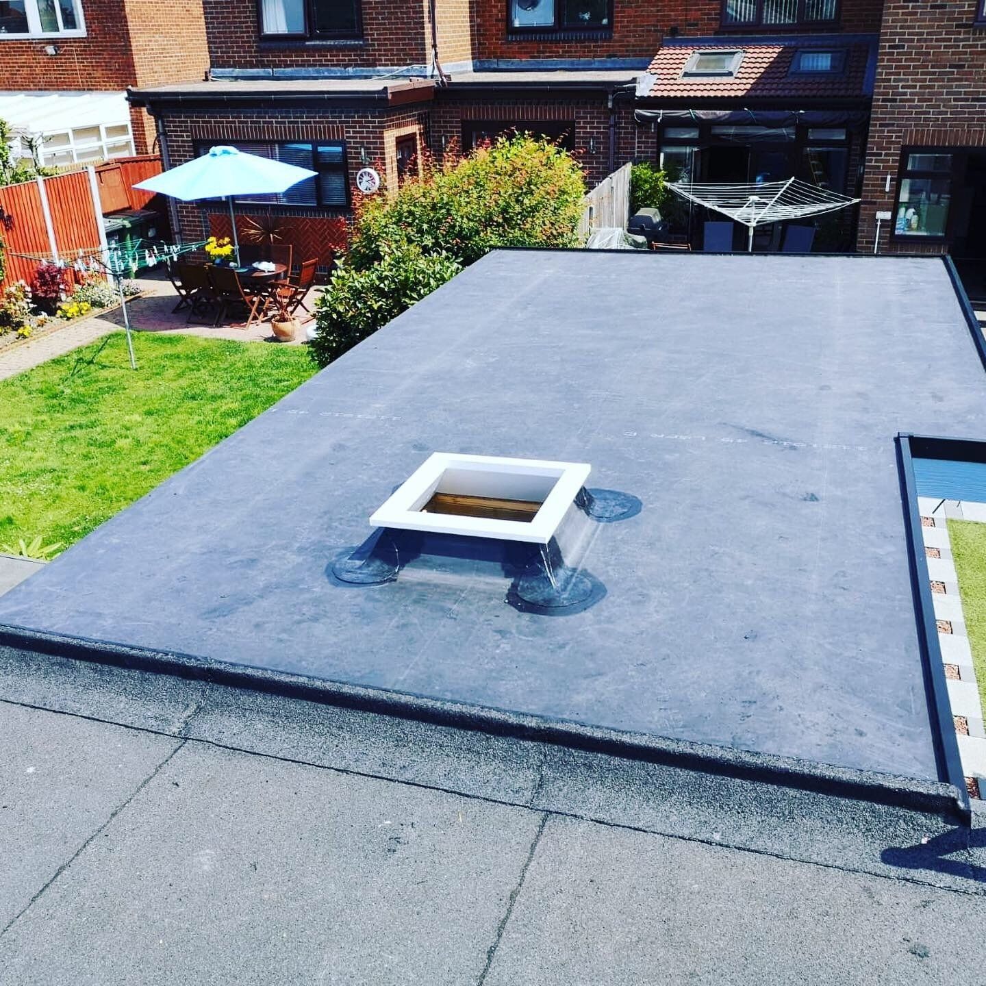a roof with a square hole in the middle of it