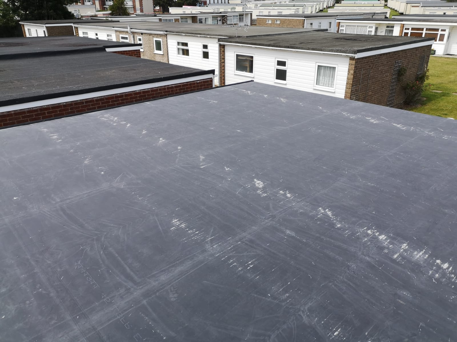 a roof with a lot of scratches on it
