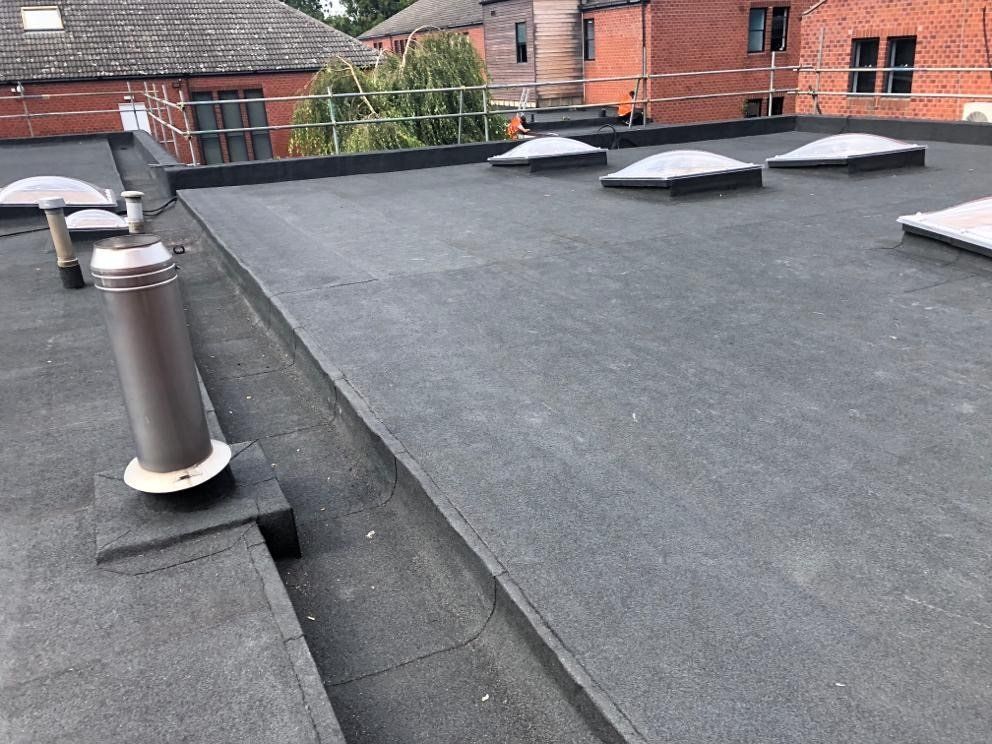 a roof with a lot of skylights on it
