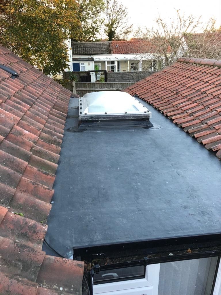 a roof with a skylight on top of it