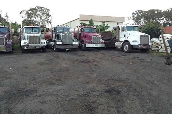 Open top dumpster trucks