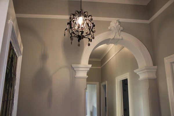 hanging lights next to archway