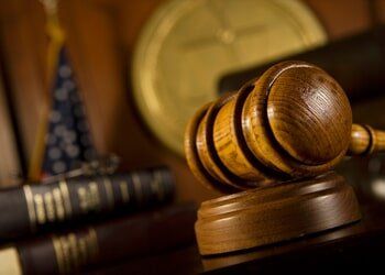Gavel On The Court Room Table — Attorney In Youngstown, OH Gavel On The Court Room Table — Attorney In Youngstown, OH