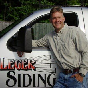 Man Replacing Window - Window Replacement in Leominster, MA