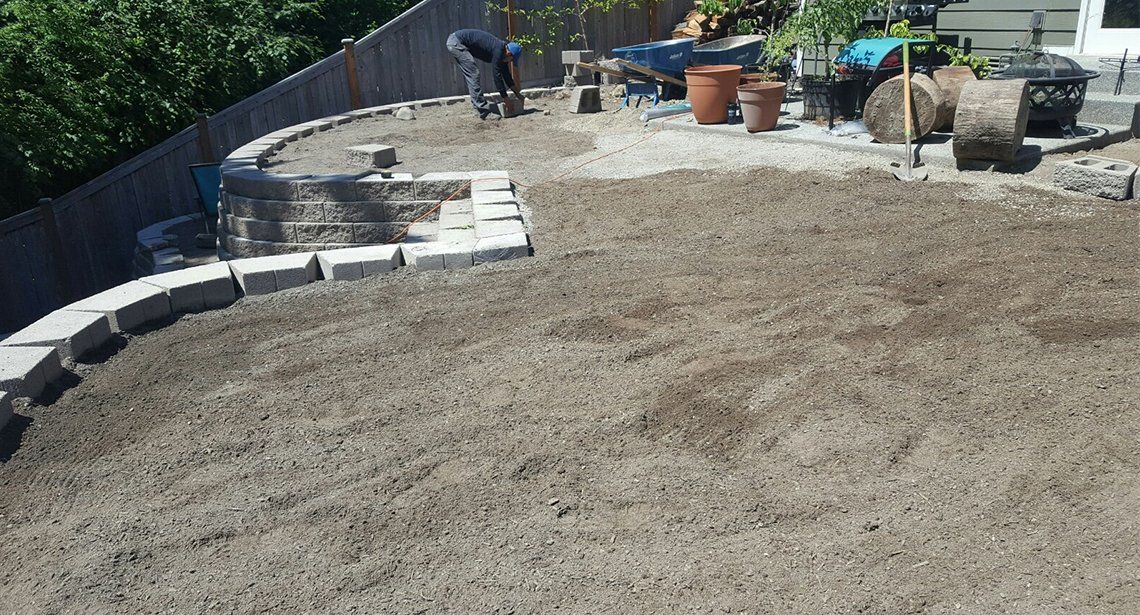 Driveway Leveling — Backyard Levels During Installation In Everett, WA