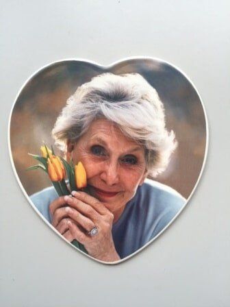 Lady Holding Flowers - Ceramic Portrait in Bradenton, FL