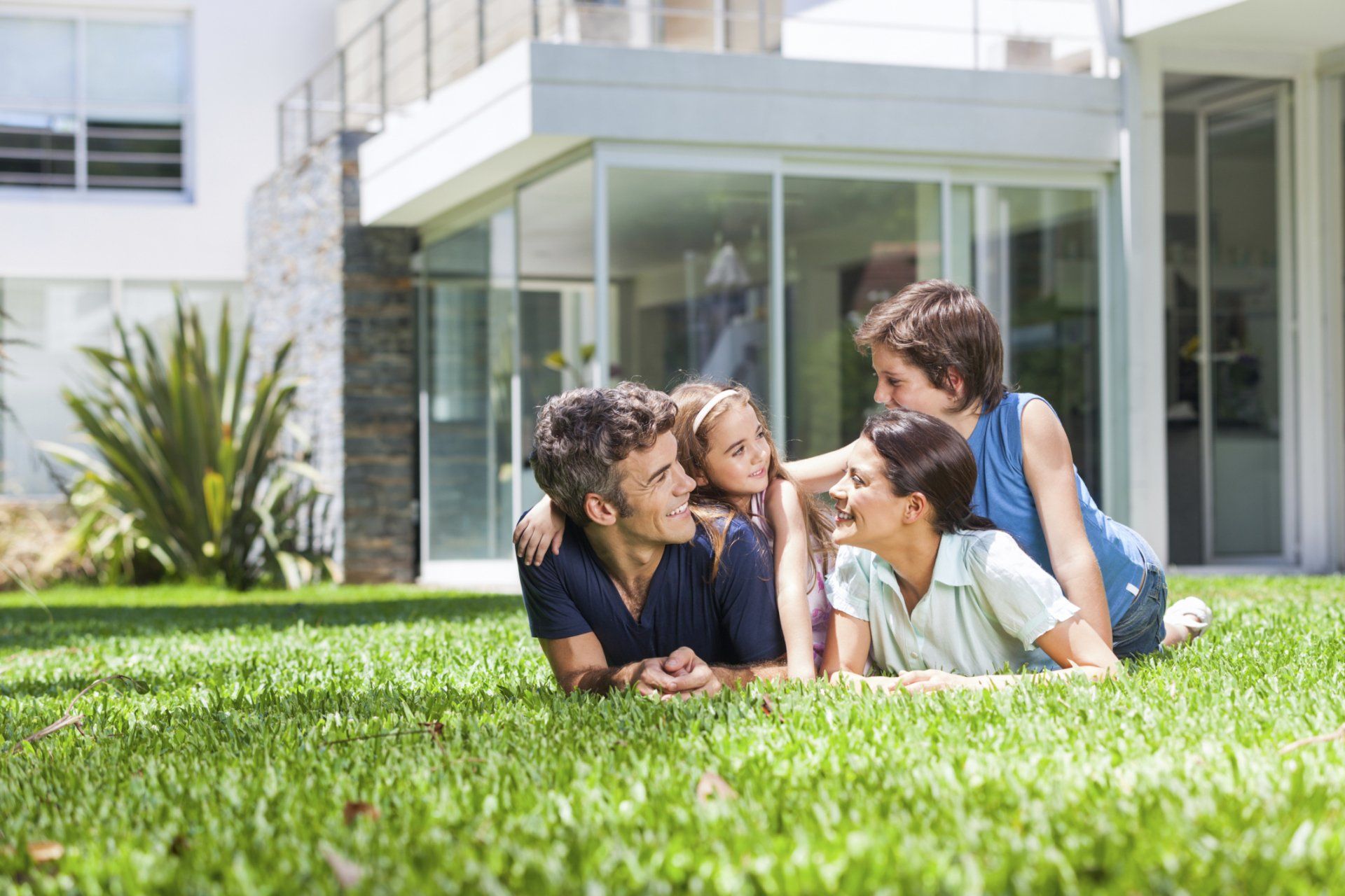Home insurance — Family in front of house in Bethlehem, PA Home insurance — Family in front of house in Bethlehem, PA