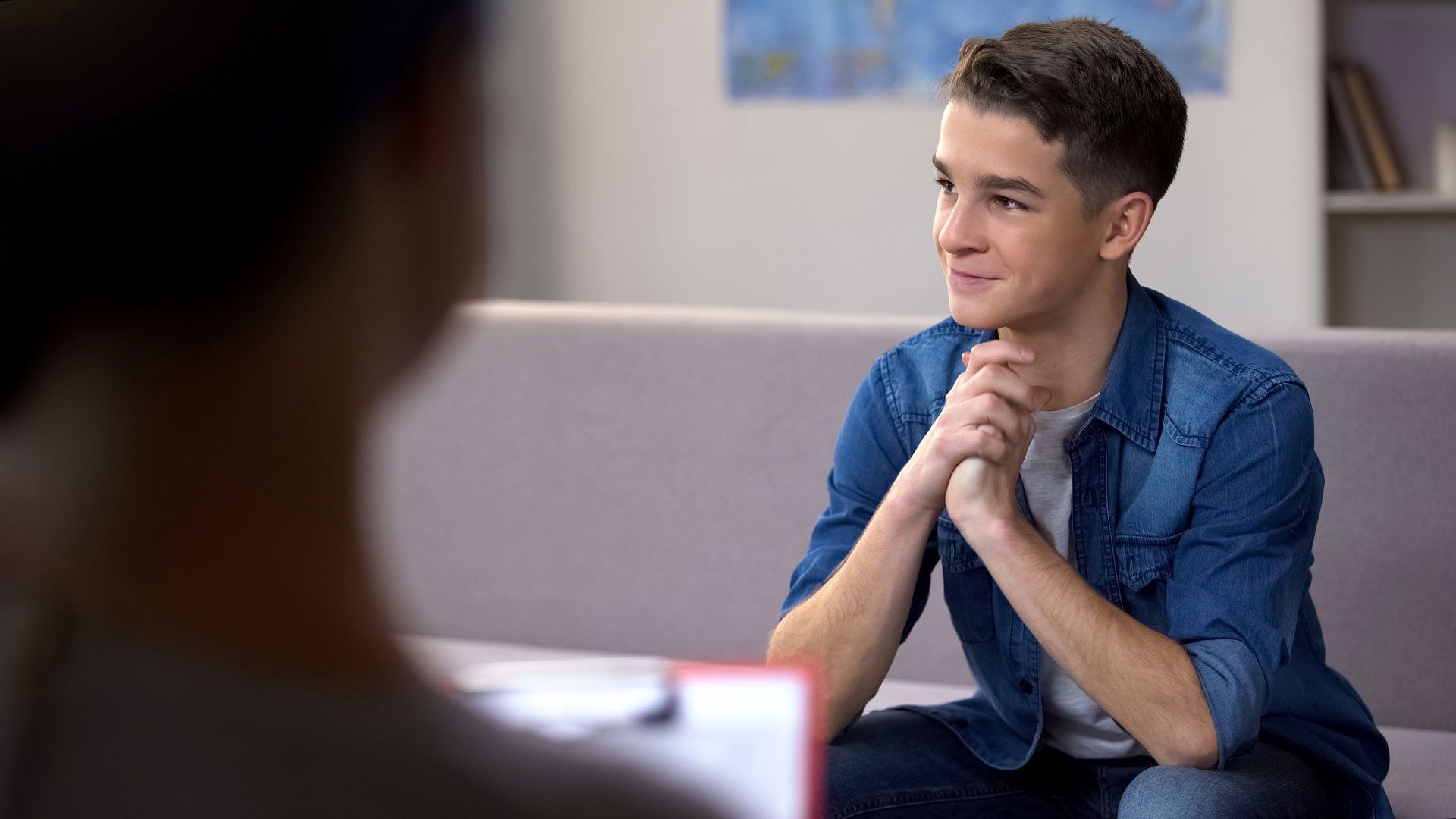 Boy with Gloating Smile Visiting Psychologist — Augusta, GA — Dr. Joseph Frey III