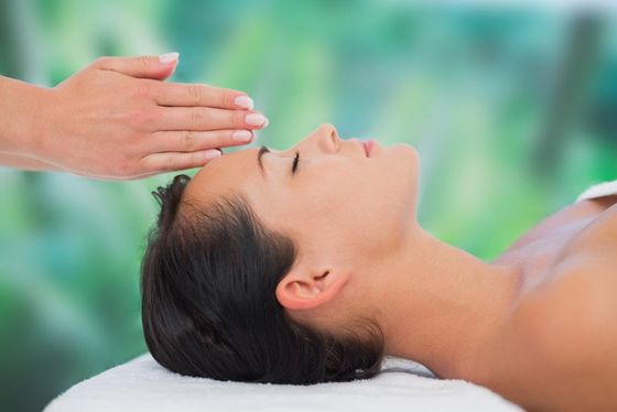 Reiki on forehead
