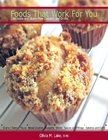 picture of muffins sitting on cooling rack with white background and green title with red border Foods That Work For You Delectable and Gluten-Free Desserts and Drinks bottom of cookbook cover red bar with white font Olivia M. Lake, RHN 
