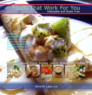 Big green letters Foods That Work For You with smaller white font below Delectable and Gluten Free on top of transparent blue bar outlined with two red lines light blue font list on left side of book cover image with small thumbnail pictures below of salads, soups, sauce and fritters below that narrow transparent blue title bar with white text Olivia M. Lake, RHN across it In the back ground is a picture of a folded up crepe with whipping cream and small chunks of kiwi on top of the whipping cream with syrup drizzled across the crepe and plate
