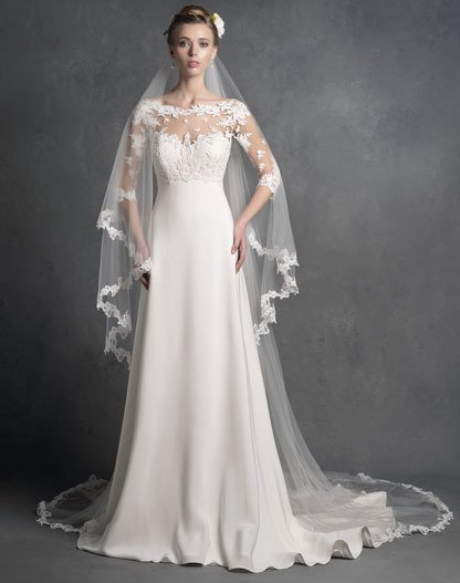 abito da sposa con velo trasparente