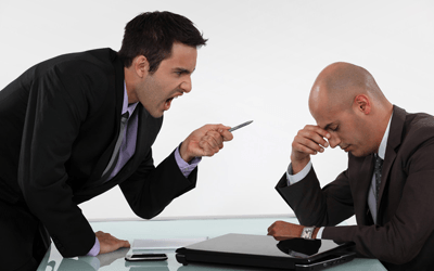 a man scolding the other