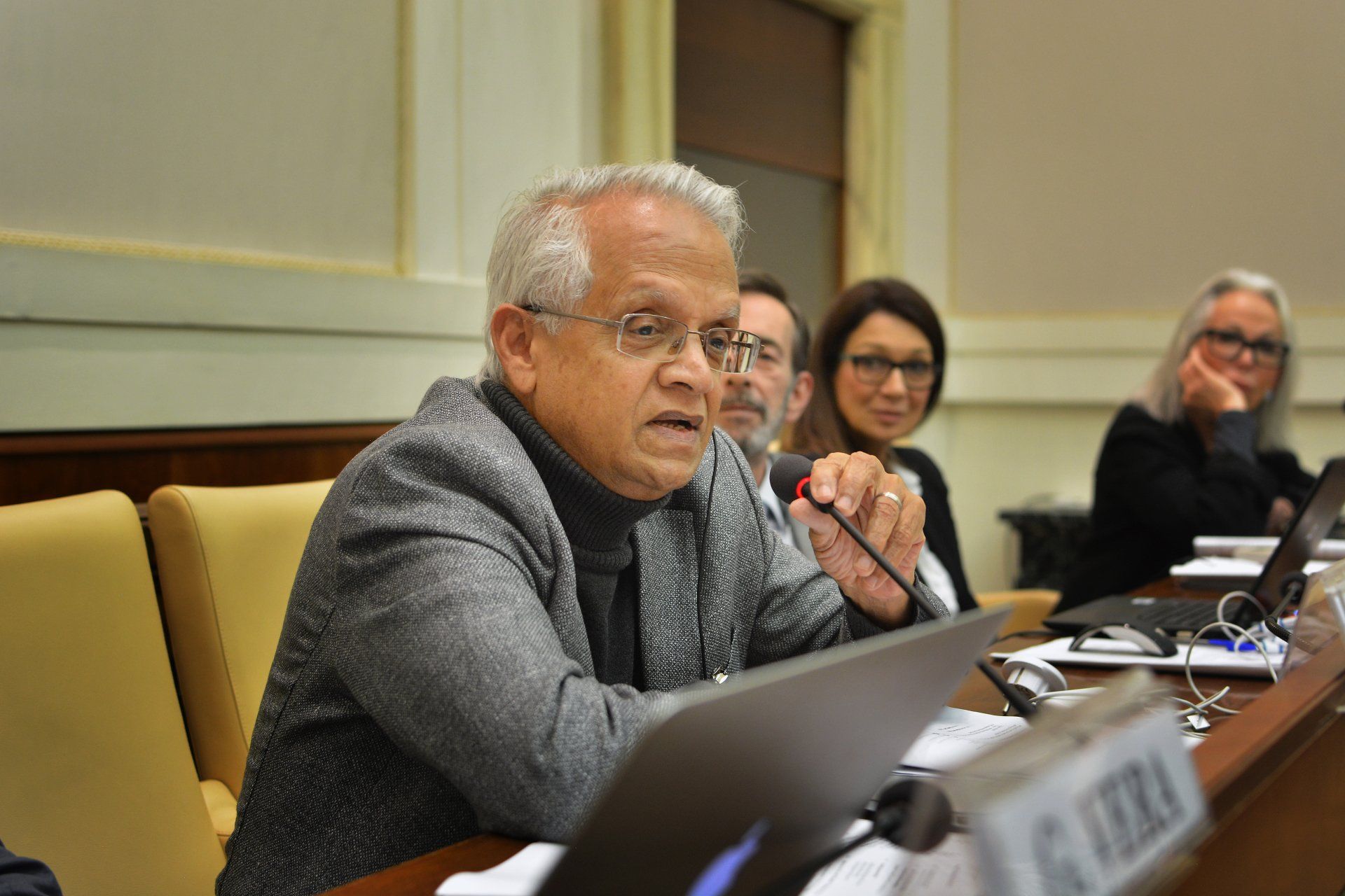 A man speaking Ethics in Action meeting on modern slavery