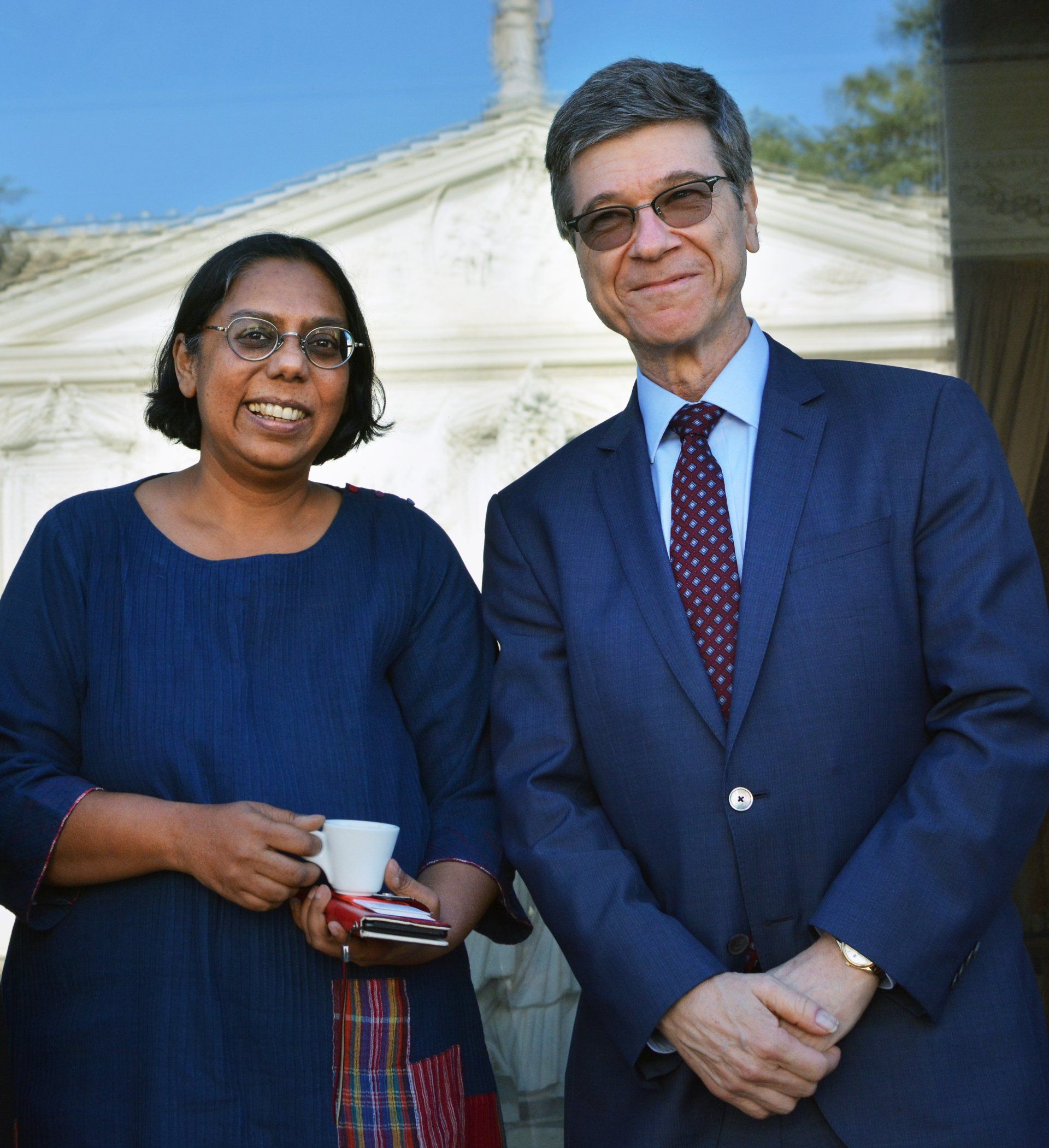 A man and a women posing for a picture during an Ethics in Action meet to discuss modern slavery