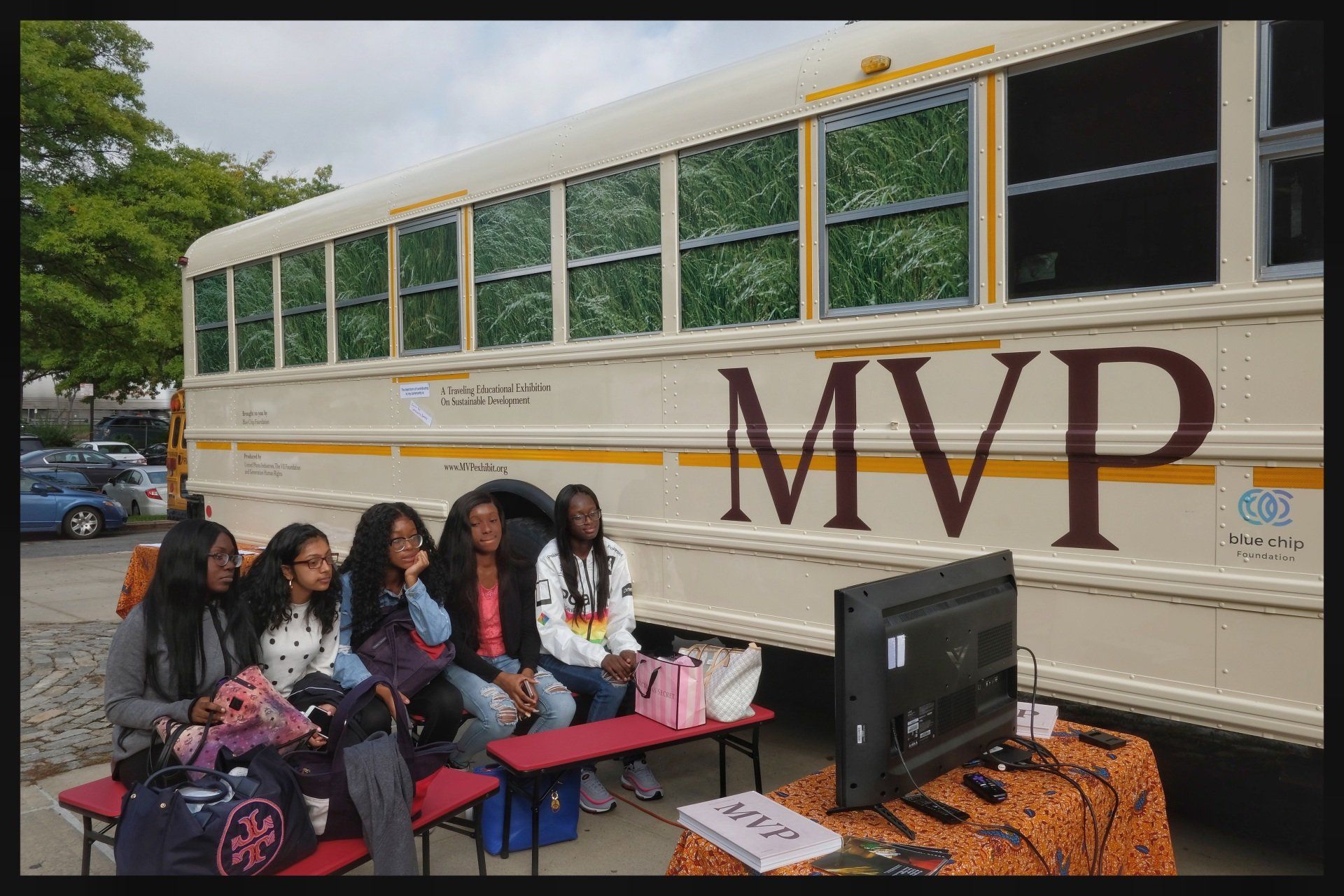 MVP Get on the Bus campaign with children watching a television