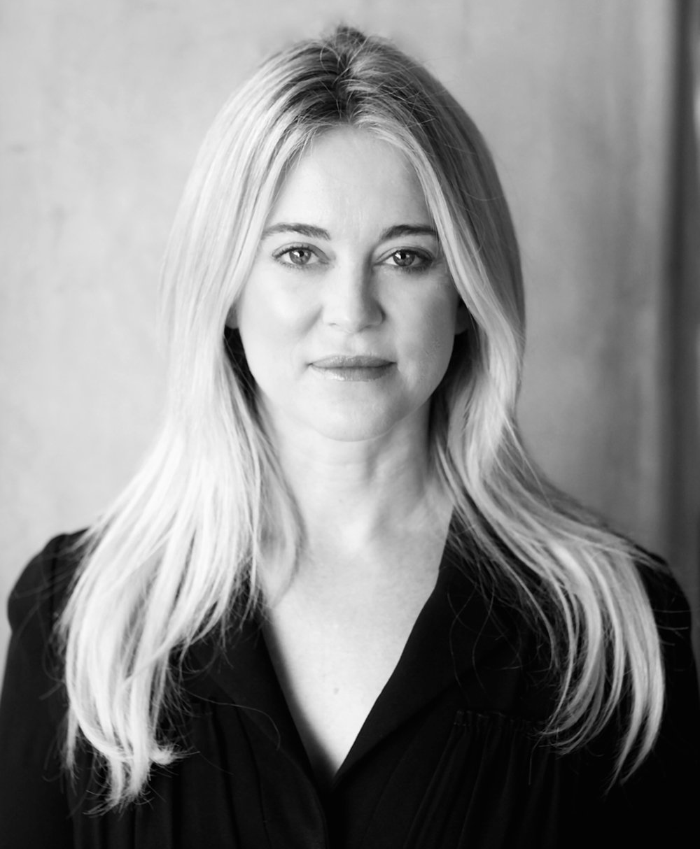 Jennifer Gross wearing a black top founder of Blue Chip Foundation
