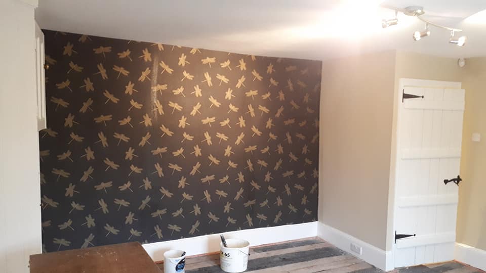 professional bedroom wallpaper hanging in bury