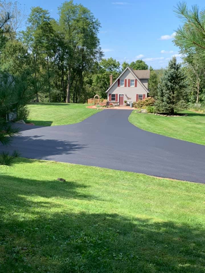 Asphalt Paving Contractor — Modern House with Asphalt Road in Zanesville, OH