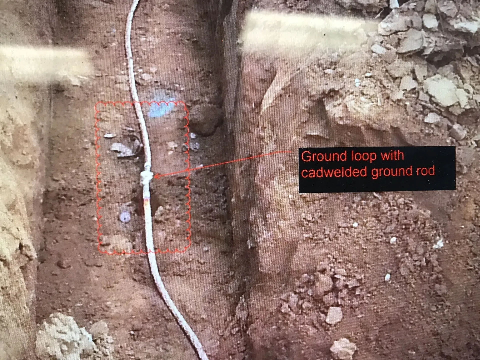 A picture of a ground loop with cadwelded ground rod