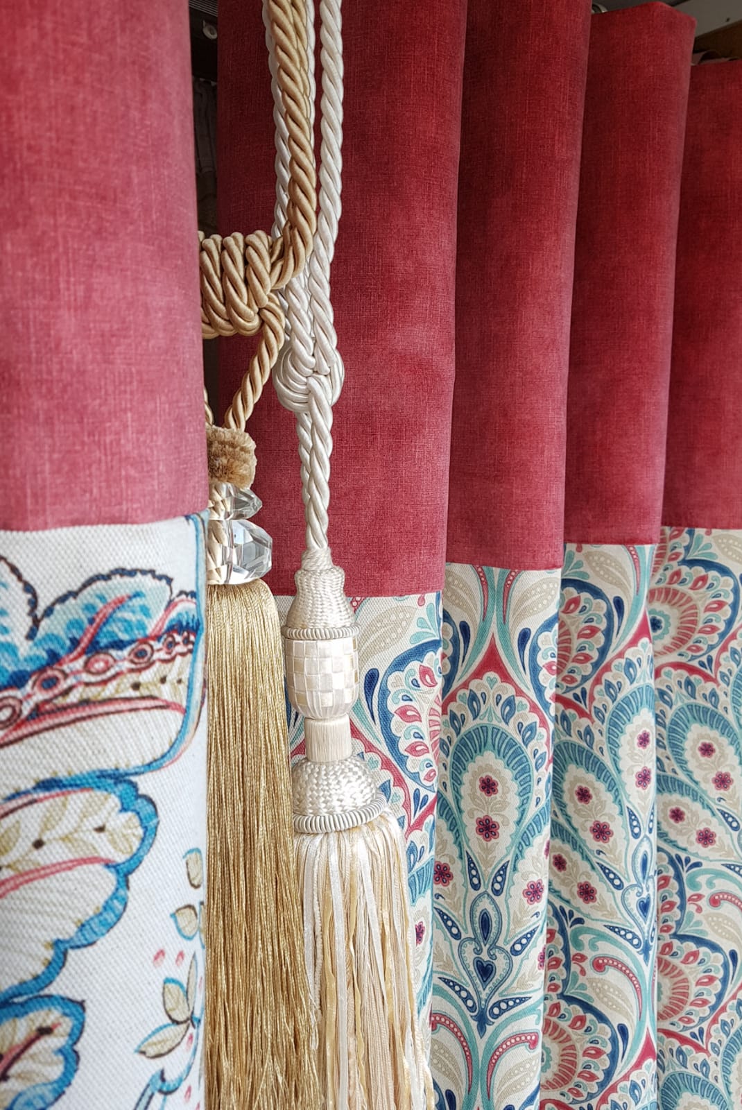 Curtain displayed in shop window with tie backs