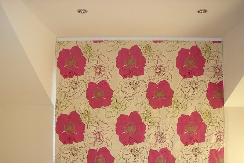dark pink flowered fabric in spare bedroom