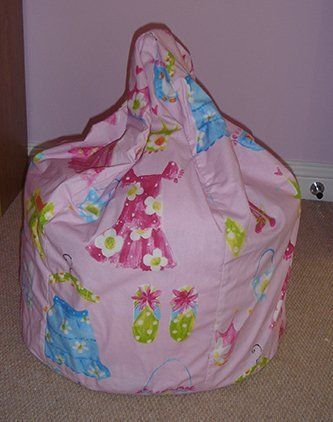 Pink with dress patterns fabric on childs beanbag