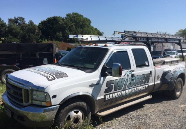 Swisher Handyman Services truck at the construction site