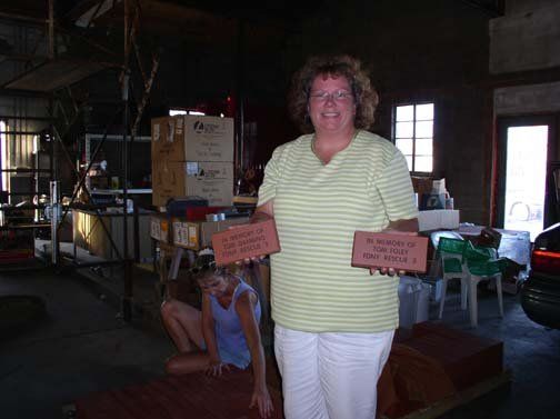 woman holding two bricks