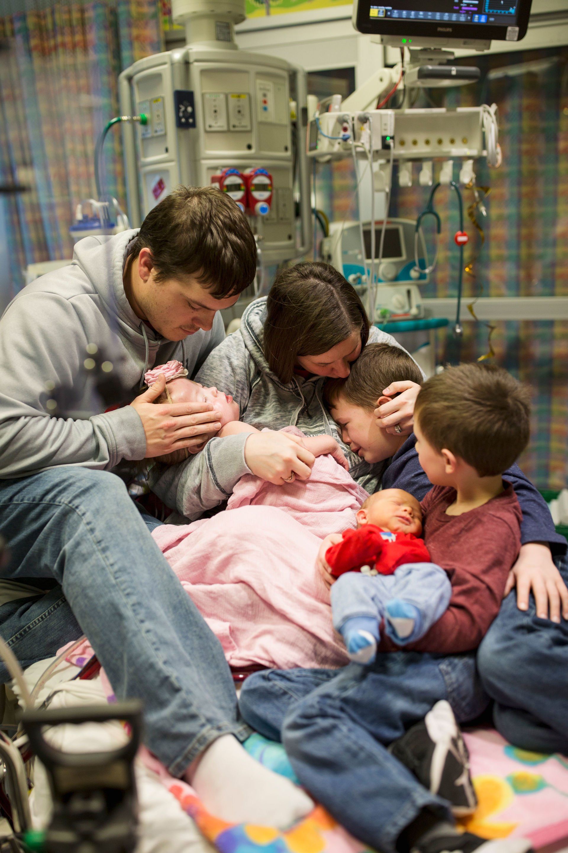 chd family crying in the hospital world of broken hearts