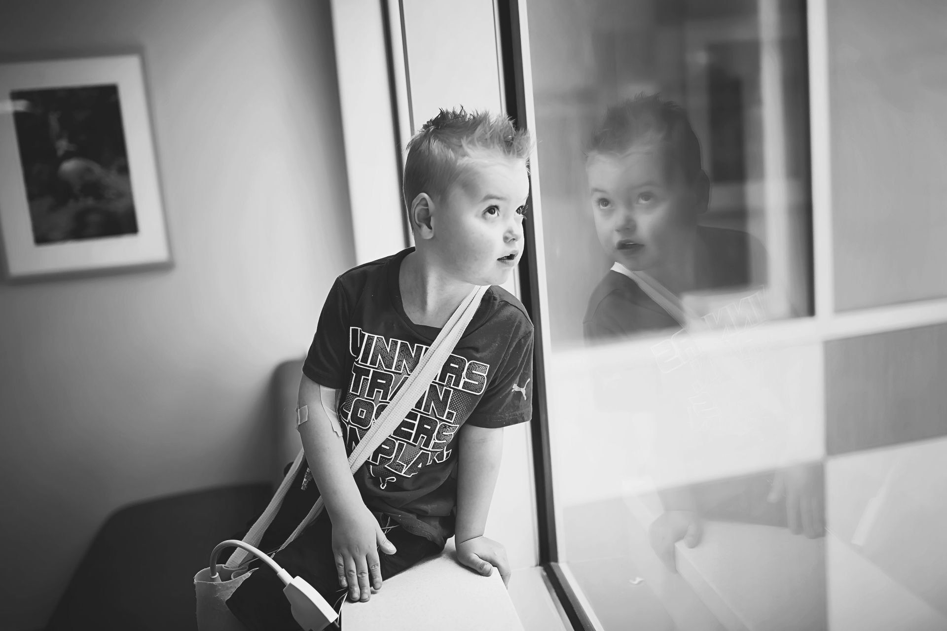 chd child looking out the window world of broken hearts