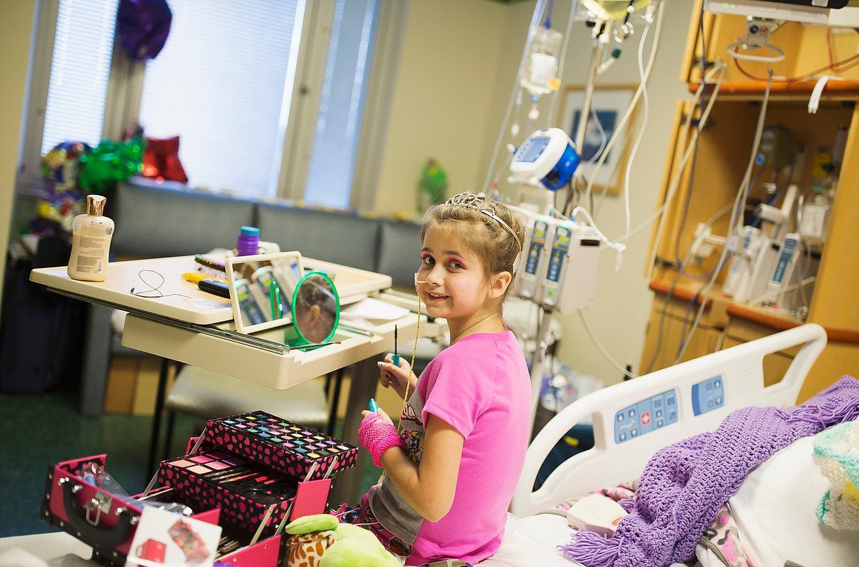 world of broken hearts chd child doing makeup